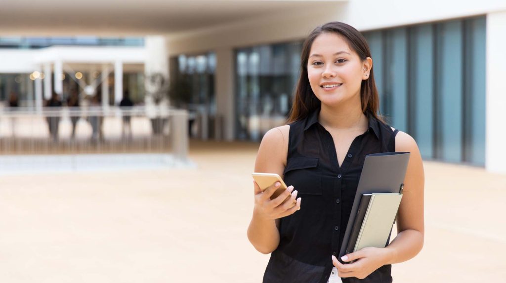 A woman getting ready to take a licensing school exam to become a Real Estate Agent in Ontario Canada