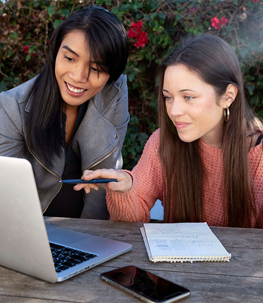 Two woman interested in Getting Licensed offers to become a licensed Real Estate agent in Ontario